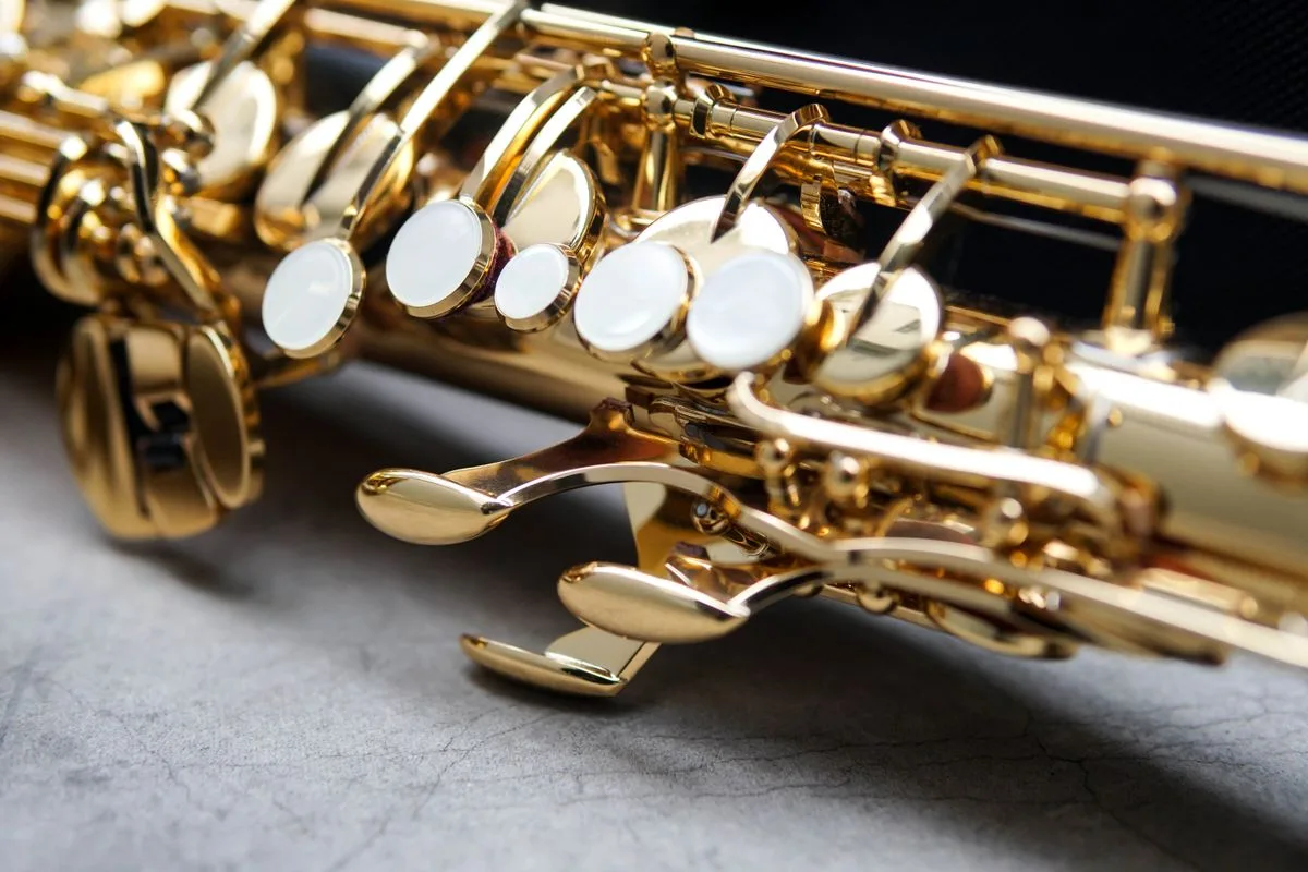 Virtual saxophone — person playing a golden saxophone on stage